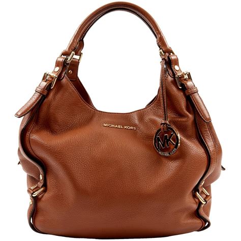 does michael kors use real leather|are Michael Kors purses leather.